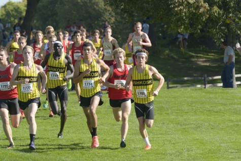 Nathan Rock as he works his way through a field of more than 150 runners at 2015 Roy Griak Invite.