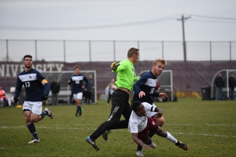 Bethel goalie Jakob Bartels charged out and fouled senior Abbai Habte, leading to Habte's penalty kick that propelled the Pipers into the playoffs on Oct 27.