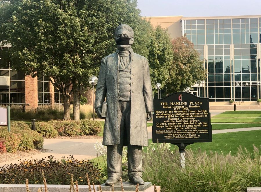 The "bishop" on campus wearing a mask as a reminder to students